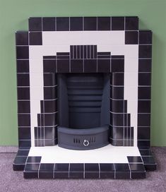 a black and white fireplace in a room