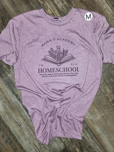 Introducing the Mama's Academy T-Shirt! This high-quality shirt is perfect for the homeschool mom who wants to represent her lifestyle and love for her kids. The shirt is no fade, soft, and comfortable, with a homeschool mom design that is long lasting. Get yours today and show your support for homeschooling families! Casual T-shirt With Letter Print, Casual Letter Print T-shirt, Cotton Crew Neck T-shirt For Home, Mom Design, Love For Her, Homeschool Mom, Love Her, No Response, Gender Neutral