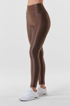 Liquid sheen style from studio to street - meet the Liquid Legging - Cafe. Lightweight, lustrous shine, quick drying, and a second skin feel with a beautiful mid-tone brown gloss make for the ultimate wear-everywhere legging.Smoothing, butt-lifting and so versatile, this legging shines from workout to wear out. Made from imported Brazilian fabric: Xtra Life Lycra for resilience and longevity, each Liquid Legging is squat-proof with four-way stretch. This item is final sale Perfect Leggings, Striped Sneakers, Liquid Leggings, Tie Dye Leggings, Compression Fabric, Clothing Retail, Vintage Havana, Tie Dye Sweatshirt, Squat Proof