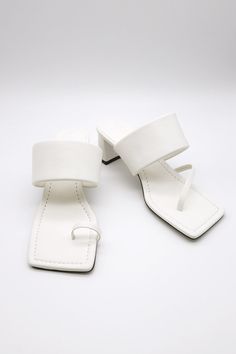 Toe Thong Mid Heeled Sandals This product has been hand-picked by Storets' stylists. Keep in mind that you would have to check on every item's details and check whether the shoes run small to size or regularly by footwear size chart. The manufacturer size is irrelevant to the actual sales size, and the sales standard size is US! Trendy White Toe Post Sandals, Adjustable White Sandals With Heel Loop, Trendy White Square Toe Sandals, White Single Toe Strap Flip Flops For Spring, White Flip Flops With Single Toe Strap, Synthetic Toe Post Sandals, Summer White Toe Post Heels, White Toe Post Heels For Summer, Summer White T-strap Sandals With Heel Loop