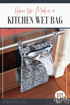 an oven with the words how to make a kitchen wet bag hanging from it's side