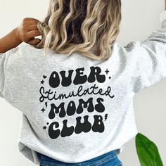 The Overstimulated Moms Club Sweatshirt is a cozy and stylish addition to any mom's wardrobe. This sweatshirt is perfect for the busy and overworked mom who needs some comfort in her daily life. The sweatshirt comes in a retro style, featuring a back print. ♥ We want you to be happy with your item, and for it to bring you joy! If you have any problems with your order or your item, please contact us prior to leaving a review. We will do what we can to take care of you and ensure that you are a ha Mom Wardrobe, Tired Mom, Club Sweatshirts, Moms Club, Club Shirts, To Be Happy, Retro Style, Daily Life, Retro Fashion