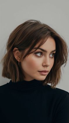 Discover 22 chic bob haircut ideas for 2025perfect for women with longshortcurlyor wavy hairFrom classic 90s styles to modern angled bobsfind the perfect bob haircut with bangslayersor for fine hairExplore bob haircuts for women over 50and curtain bangs too Short Haircuts For Women With Curtain Bangs, Short Hair With Long Side Bangs, Long Curtain Bangs Bob, Cute Chin Length Haircut, Short Haïr Cut For Women, Short Hair Frame Face, Gracie Abrams Bob Cut, Mid Bob With Curtain Bangs, Different Bob Haircut