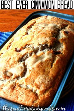 the best ever cinnamon bread recipe is in a blue baking pan on a wooden table