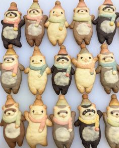 there are many decorated cookies in the shape of animals