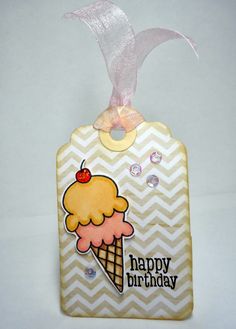 a birthday tag with an ice cream cone on it's side and the words happy birthday