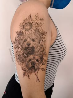 a woman with a dog and sunflower tattoo on her arm