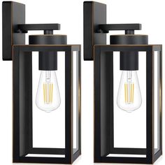 two black lanterns with one light bulb on each side and the other is turned on