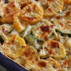 a casserole dish with zucchini and squash