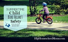 a little boy riding a bike down a dirt road with the words summertime child bike helmet safety