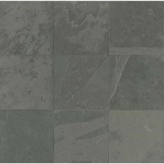 a tile floor with different shades of gray