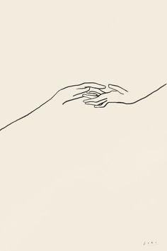 two hands reaching for each other over a white surface with black lines on it, in front of a beige background