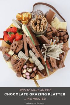 an assortment of chocolates, strawberries, and other treats on a platter