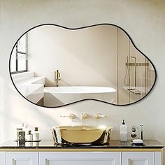 a bathroom with a sink and mirror on the wall