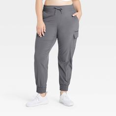 Why we're ALL IN: Mid-rise cargo joggers in a regular fit made from four-way stretch fabric for a comfy design that moves with you. The moisture-wicking, quick-dry fabric helps keep you cool and fresh, and has a UPF 50+ rating for sun protection. Plus, the elastic waistband with drawstring closure helps you find the right fit and there are multiple pockets for stashing your essentials. All in Motion™: Made for every move, priced for every day. Mid-rise Athleisure Joggers With Elastic Waistband, Mid-rise Athleisure Joggers With Pockets, Full-length Leisure Joggers With Pockets, Sporty 4-way Stretch Cargo Pants With Elastic Waistband, Stretch Full-length Joggers With Side Pockets, All In Motion, Racerback Sports Bra, Cargo Joggers, Shipt Shopper