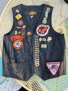 Vintage Leather Motorcycle Vest Hoosier Wing Riders Patches Medals Awesome Fits Size Large but see pics for measurements It will need cleaning - has several areas of crusty dirt - we will leave it you whether you do it yourself or have it professionally done. Quality Made in USA Absolutely full of medals and patches that give it that one-of-a-kind character Anderson Indiana Hoosier Gold Wing Riders Association Enjoy ! Quick shipping. We ship same or next day with USPS Priority Mail We are a smal Biker Vest Patches, Anderson Indiana, Riding Vest, Vest Patches, Motorcycle Vest, Gold Wing, Summer 2025, Indiana Hoosiers, Motorcycle Riding