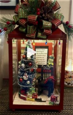 a christmas display case with presents on it