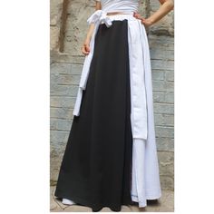 "Casual comfortable long skirt🤩 Extravagant designs and high quality fabrics. The item from the pictures is size S For more information feel free to ask questions. Material &Care Cotton and elastane Machine wash 30oC Hand wash at low temperatures Do not machine dry Medium hot iron Sizing We make sizes from xs to 5xl as well as customized measures.So don't hesitate to contact us and make one for you. 🛫🎁Shipping🎁 🛬 STANDARD SHIPPING Europe : 6-8 business days USA&Canada : 8-10 business days E Black Long Lined Wrap Skirt, Black Long Wrap Skirt With Lining, Woman Skirt, Cocktail Skirts, Skirt Casual, Black And White Skirt, Skirt Maxi, Party Skirt, Long Maxi Skirts