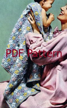 a woman holding a child wrapped in a blanket with the words pdf pattern below it