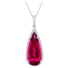 Natural Rubellite 5.03 carats set in 14K White Gold Pendant with 0.29 carats Diamonds Details SKU 3999 Metal type 14K White Gold Metal Weight 1.76 gr Center Stone Rubellite Side Stones Diamonds Report N/A Center Stone Quantity 1 Total Weight 5.03 carats Color Pinkish Red Color intensity Vivid Shape Pear Clarity Eye Clean Cut Brilliant/step Dimensions 18.70 x 7.48 mm Diamonds Quantity Multiple Total Weight 0.29 carats Color White Color intensity G-H Shape Round Clarity VS2/SI1 Cut Brilliant Origi Step Dimensions, White Gold Pendant, American Diamond, Natural Red, Diamond White, Gold Pendant, Types Of Metal, Gold Metal, Jewelry Necklace Pendant