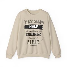 Funny Half Marathon Sweatshirt to celebrate all 13.1miles of effort. A great gift sweater for runners who have graduated to half marathoners. From long training run to the medal final race day. You did it ! Unisex sizing and a great gift for a mom or dad who runs. Can customize with name and finish time please ask. *For the oversized look go up in sizing to suit your taste. Ideal for any situation, a unisex heavy blend crewneck sweatshirt is pure comfort. These garments are made from polyester a Casual Winter Running Sweatshirt, Casual Long Sleeve T-shirt For Running, Casual Long Sleeve Running Sweatshirt, Casual Long Sleeve Sweatshirt For Running, Cotton Activewear With Letter Print For Running, Run Shirt, Marathon Gift, Gifts For Runners, Long Train