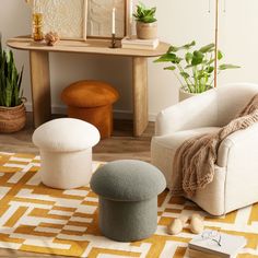 the living room is clean and ready to be used for decoration purposes, including foot stools