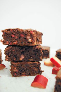 some brownies are stacked on top of each other