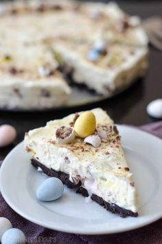 a slice of easter egg cheesecake on a plate