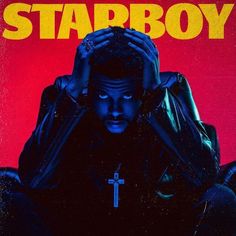 a man sitting in front of a red background with the words starboy on it