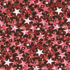 red and white stars with pink centers are on a maroon background, as well as a ruler