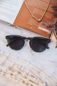 Add a touch of flair to any look when you embellish with the Tate! These sunglasses have a retro round-frame shape that never goes out of style and looks good on almost anyone, making them a perfect staple for any wardrobe. This stylish frame comes in black, crystal blue, and crystal brown colors and features 100% UV protection that keeps your eyes safe while you’re enjoying the time in the sun. Gender: Unisex UV Protection: 100% UVA/ UVB Protection (UV 400) Lens: Polarized Lens Frame: Acetate F Trendy Blue Tinted Shield Sunglasses, Sun Gender, Elegant Blue Tinted Sunglasses, Trendy Blue Anti-reflective Shield Sunglasses, Blue Tinted Shield Sunglasses Polycarbonate, Modern Blue Anti-reflective Sunglasses, Stainless Steel Hinges, Online Clothing Boutiques, Crystal Blue