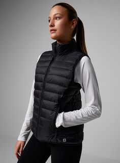 Women > Coats I.FIV5 - Recycled nylon packable sleeveless puffer vest I.FIV5  i.FiV5 exclusive   Our trendy eco-friendly puffer jacket is a practical, light and minimalist piece that comes in a sleeveless design perfect for spring outings. Quilted and waterproof recycled nylon fabric Certified responsible premium feather and down insulation Rugged water-repellent Teflon EcoElite finish made from renewable plant-based materials Full-length zip Zip-front pockets Packs into a small travel pouch   T Puffer Vest Women, Sleeveless Puffer, Womens Puffer Vest, Workout Equipment, Women Coats, Nylon Fabric, Fall Style, Travel Pouch