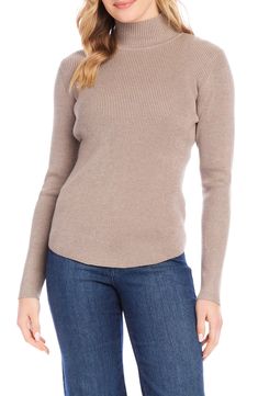 This stretchy top detailed with a cute mock neck makes a perfect layering piece. 25" length (size Medium) Mock neck Long sleeves 70% rayon, 30% nylon Hand wash, dry flat Imported Spring Layering High Neck Sweater, Trendy Stretch Mock Neck Top For Workwear, High Neck Textured Knit Top For Layering, Spring High Neck Knit Turtleneck, Fitted Fine Knit Mock Neck Top, Textured Knit High Neck Top For Layering, Knit High Neck Turtleneck For Spring, High Stretch Knit Turtleneck Top, Spring Knit Turtleneck