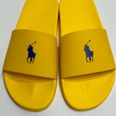 Brand New Without Box. No Box. Msrp $70 Men’s Size 11 Polo Ralph Lauren Yellow With Navy Blue Pony Slides Sandals Slipper No Box Yellow Summer Slides With Rubber Sole, Yellow Slides With Rubber Sole For Summer, Yellow Rubber Sole Slides For Summer, Yellow Non-slip Slide Sandals, Yellow Slides With Rubber Sole And Round Toe, Yellow Slides With Round Toe And Rubber Sole, Yellow Beach Slides With Rubber Sole, Yellow Open Toe Slides With Rubber Sole, Yellow Slip-on Slides With Removable Insole