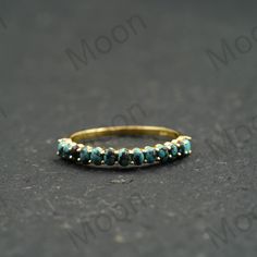 Turquoise Wedding Band, Oval Cut Turquoise Stacking Band, Handmade Ring, Turquoise Jewelry, Half Eternity Solid Gold Band, Gift For Her ◈ Item Details ◈ Metal: 925 Sterling Silver    Style: Gemstone Ring Main Stone: Turquoise  Main Stone Color: Blue Main Stone Shape: Oval Birthstone Month: December S I L V E R J E W E L R Y C A R E Silver is not the best friend of oxygen and sulfur; it can be oxidized and tarnished from time to time it is the nature of silver. To keep the silver shiny and prevent it from oxidizing fast, we would recommend the following instructions; * Avoid any chemical agents including perfume, makeup, and hair spray. * Avoid wearing silver jewelry to the beach, shower, or exercise. * Remove before you sleep, clean with a silver cloth, and keep it in a dry area or in a sm Adjustable Gold Turquoise Ring For Wedding, Adjustable Oval Turquoise Ring For Wedding, Turquoise Emerald Ring For Anniversary, Adjustable Turquoise Gemstone Ring For Weddings, Blue Emerald Wedding Ring, Oval Turquoise Ring For Wedding, Gold Oval Turquoise Ring For Wedding, Gold Oval Turquoise Wedding Ring, Gold Turquoise Oval Ring For Wedding