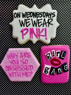 two decorated cookies with words on them and one saying,'on wednesdays we wear pink why are you so obsesed with me? '