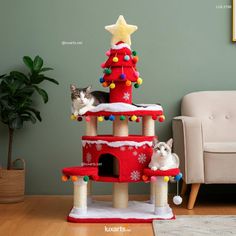 two cats sitting on top of a cat tree