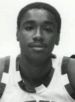 an old black and white photo of a basketball player