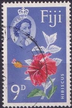 a postage stamp with a flower and a crown on the top, in front of a blue background