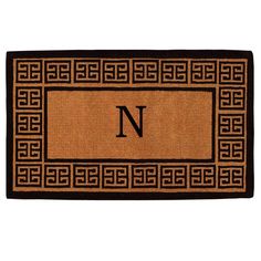 a door mat with an intertwined border on the front and sides, in black and tan