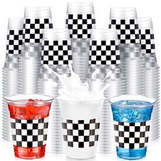 several cups with different colored liquids in them