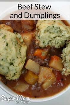 beef stew and dumplings in a white bowl