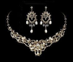 Affordable Elegance Bridal - Pearl and Crystal Gold Wedding Necklace and Chandelier Earrings, $124.99 (https://affordableelegancebridal.com/pearl-and-crystal-gold-wedding-necklace-and-chandelier-earrings/) Elegant Gold Chandelier Earrings For Reception, Gold Crystal Jewelry Sets For Reception, Crystal Gold Jewelry Sets For Receptions, Elegant Gold Bridal Accessories With Intricate Design, Gold Dangle Bridal Necklace For Wedding, Gold Wedding Necklace, Wedding Suggestions, Statement Necklace Wedding, Gold Necklace Wedding