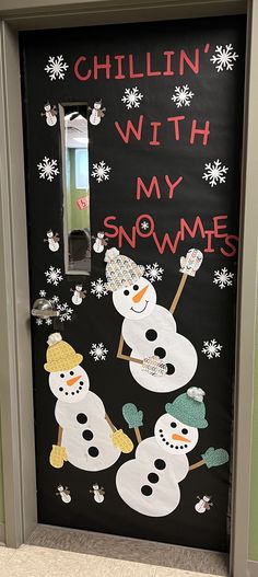 a door decorated with snowmen and the words chillin'with my gnomes