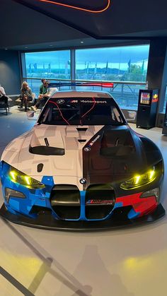 the bmw sports car is on display at the museum