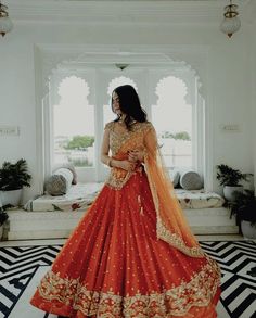 Credits to the rightful owner. Orange Indian Outfit, Madonna Vogue, Best Indian Wedding Dresses, Orange Lehenga, Simple Lehenga, Desi Outfits, Wedding Lehenga Designs, Indian Bride Outfits