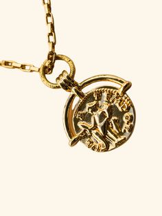 The Roman Coin Necklace combines a delicate gold link 18 kt. Gold plated chain and a detailed Roman coin pendant, exuding sophistication and historical charm. Each intricate link in the chain complements the intricacies of the coin, creating a timeless and refined accessory perfect for any occasion. 18 Inches in length +2 inch extender Complete your look with The G Necklace. G Necklace, Roman Coins, Gold Link, Coin Necklace, Coin Pendant, Gold Plated Chains, Coin, Gold Plate, Plating