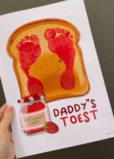 a father's toast with handprints on it and a strawberry jam jar