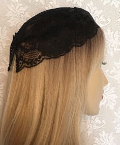 The BLACK LACE BUCHARIAN STYLE DOILY HEAD COVER is a beautiful and elegant hair accessory that combines traditional elements with a modern style. Made from high-quality black lace, this head cover is perfect for those looking to add a touch of sophistication to their look. Also available in WHITE. Inspired by the traditional head coverings worn by the Bucharian Jewish community, this head cover features intricate lace patterns and delicate floral details. The doily style adds a unique and feminine touch to the overall design, making it a great accessory for special occasions or everyday wear. Not only is this head cover stylish, it also provides a practical solution for those seeking a modest fashion option. So lightweight, easy to wear and can be secured in place with attached hair comb. Black Fitted Headband For Wedding, Elegant Lace Hair Accessories With Matching Headband, Elegant Lace Hair Accessories With Adjustable Fit, Gothic Adjustable Headpieces For Weddings, Elegant Lace Hair Accessories For Party, Gothic Adjustable Wedding Headpiece, Black Adjustable Hair Accessories For Wedding, Adjustable Gothic Headpiece For Weddings, Adjustable Black Hair Accessories For Wedding