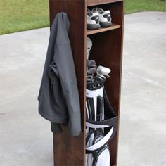 a wooden rack with golf gear on it